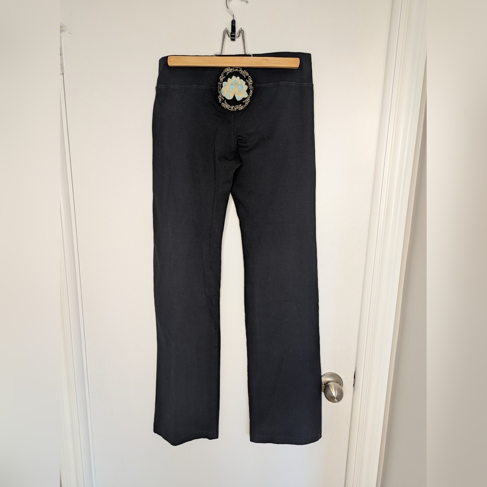 PINK LOTUS YOGA PANTS SIZE MEDIUM